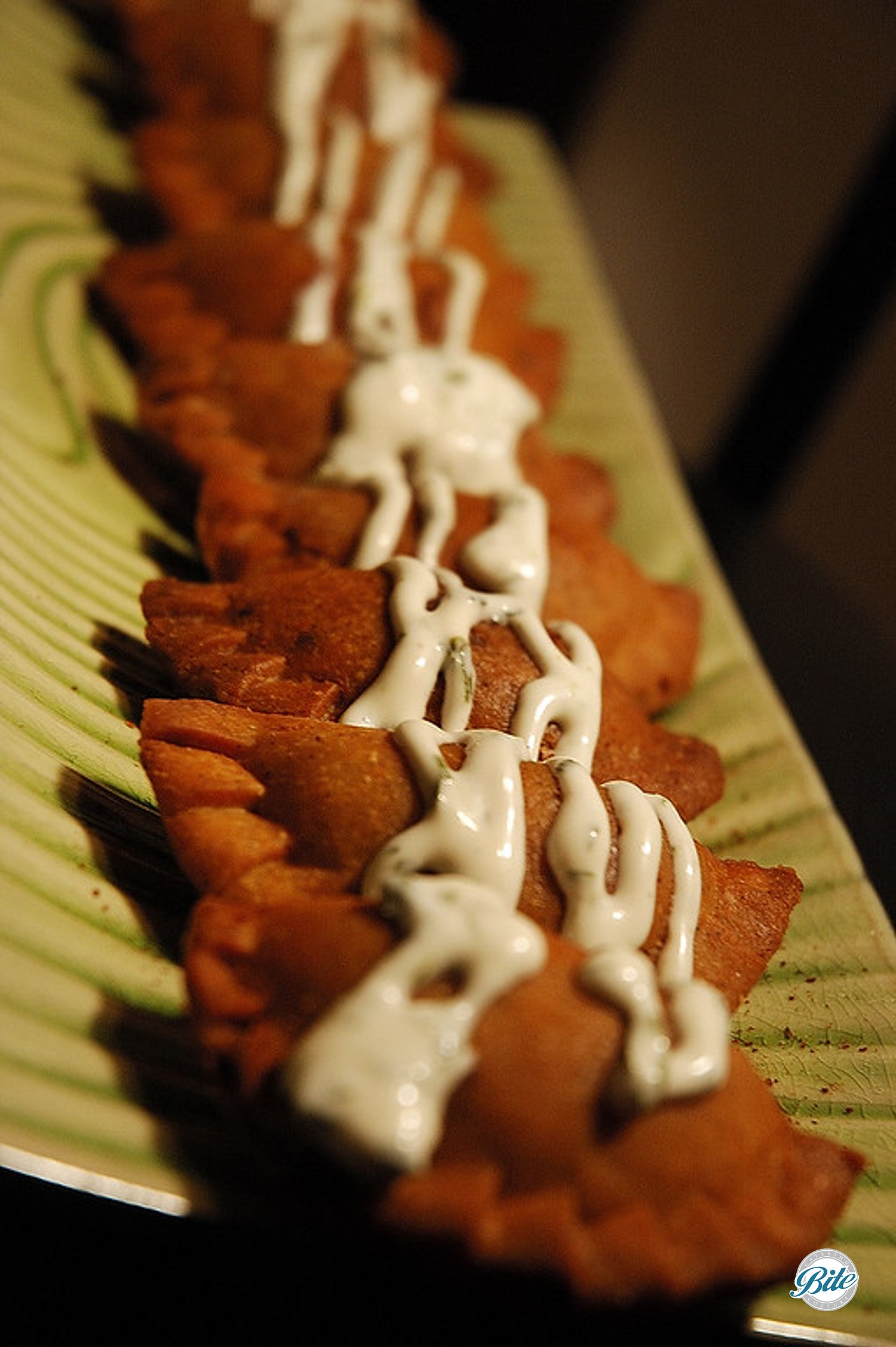Delicious beef empanada with cilantrolime crema Bite Catering Los